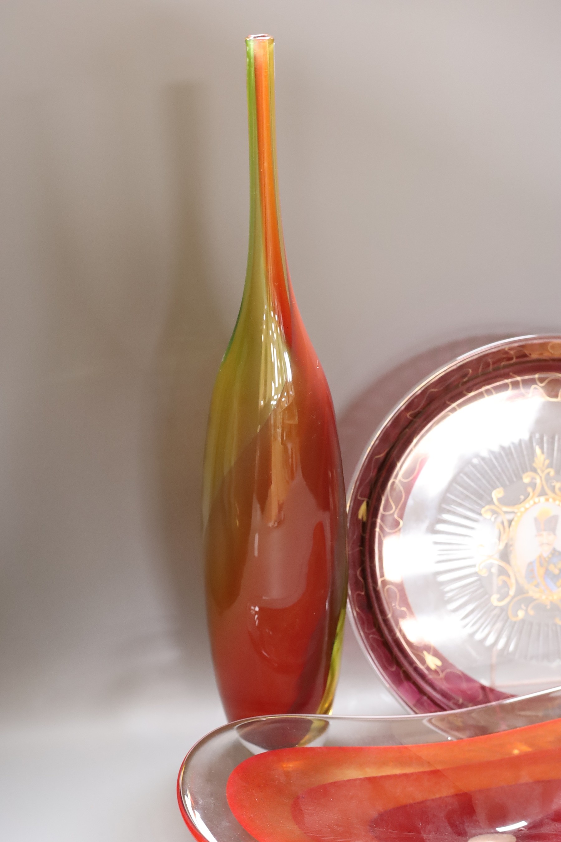 A Kosta Boda glass vase, signed K Engman, a signed art glass dish and a large French glass plate, tallest 54cm
